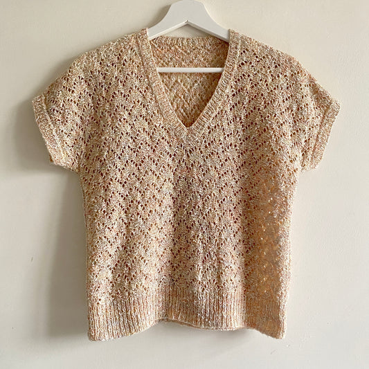 Vintage 80s light peach hand knit Short sleeves V neckline Decorative knit throughout Machine washable Length 22"