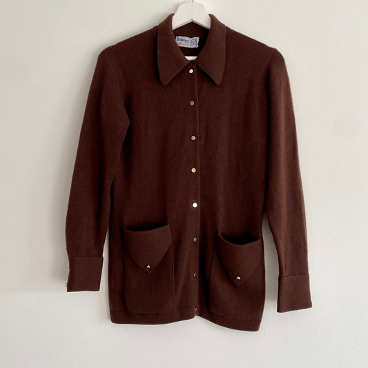 Brown vintage cashmere knit cardigan By Ballantyne of Peebles Rounded large collar Button down front fastening  Two front patch pockets with flap and button decoration  Two button cuff fastening  100% Pure Cashmere