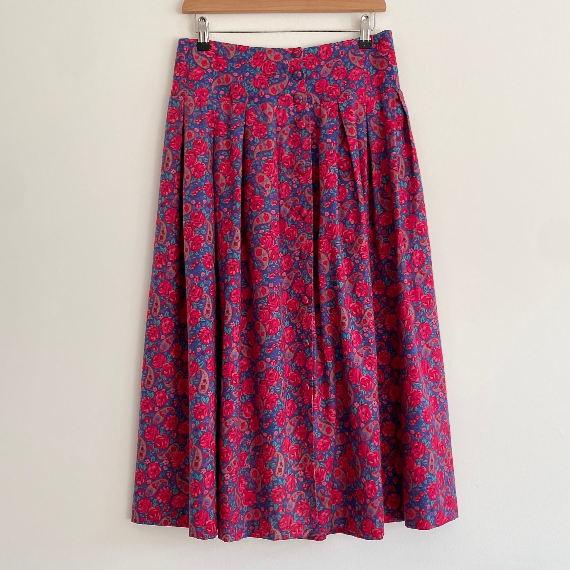 Vintage 80s/90s ﻿blue and red toned full skirt By Laura Ashley Paisley pattern Deep waistband Button front fastening  Box pleats to front and back 100% Cotton