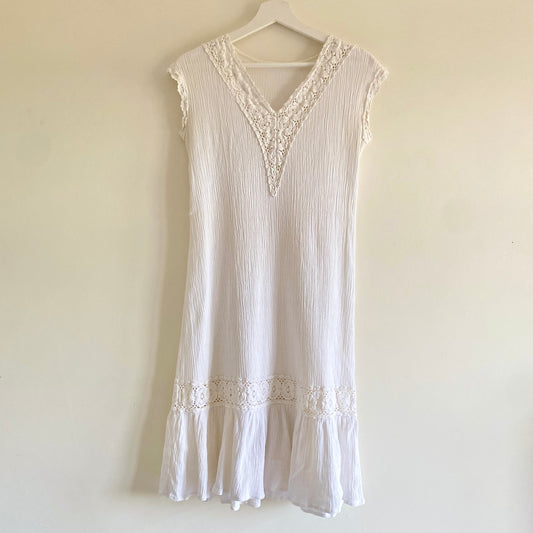 Late 70s vintage cream dress V neckline with crochet lace detail Sleeveless with crochet edging Tiered hem Crinkle Cotton fabric Machine washable