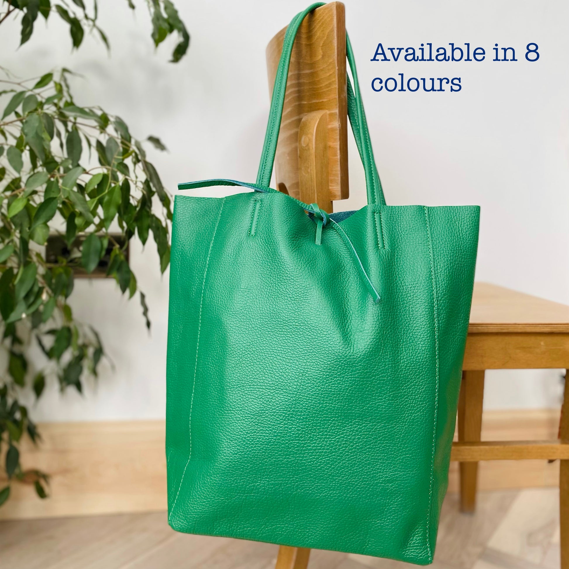      The Essential Leather shopper bag     Tie top fastening     Internal zip pocket     Bag dimensions 36cm (L) x 12cm (W) x 37cm (H)     Shoulder strap 28cm long     100% Leather      Pebble finish Leather     Made in Italy     Available in Black, Navy, Red, Mustard, Tan, Nude, Green and Blue