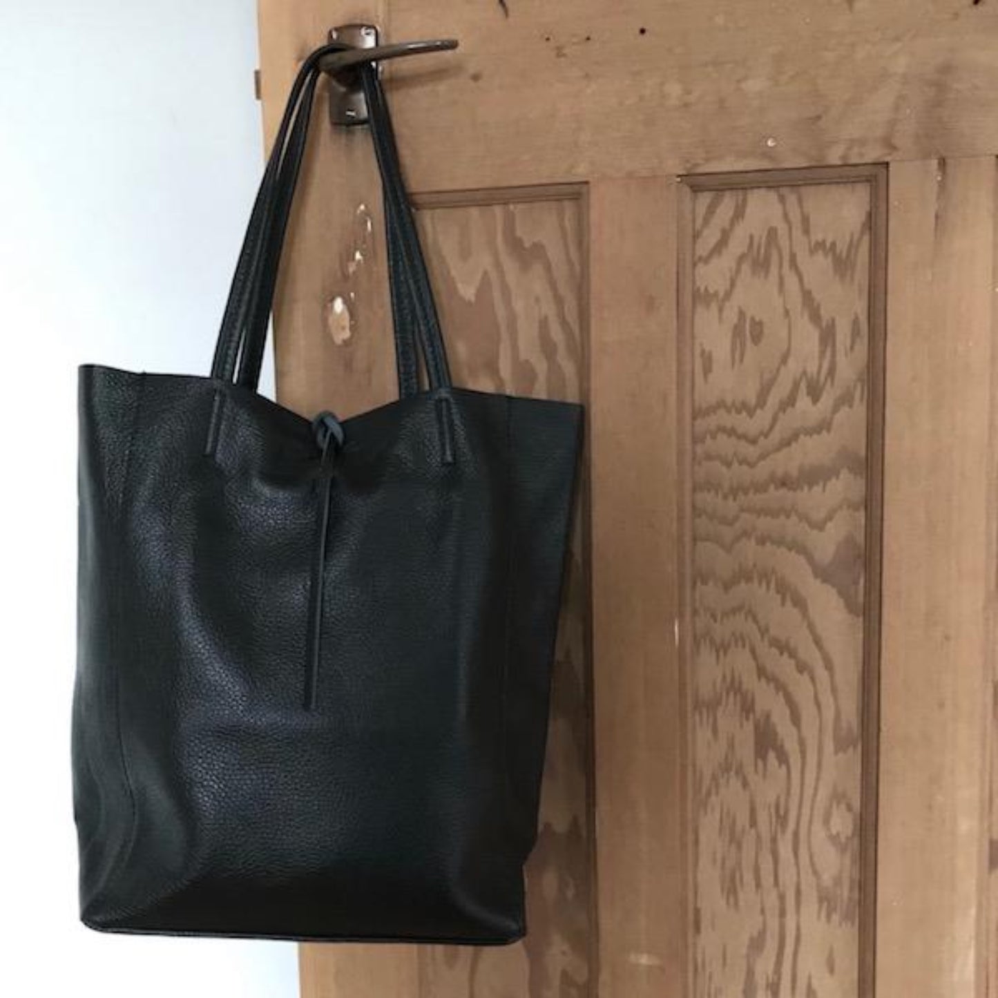 black leather shopper bag